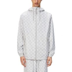 Kurtka RAINS STORM BREAKER W3 Biały. Białe kurtki męskie Rains, bez wzorów, z syntetyku, bez ramiączek, bez kaptura. Za 387.99 zł.