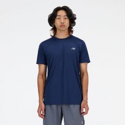 Koszulka męska New Balance MT41222NNY – granatowa. Niebieskie t-shirty sportowe męskie New Balance, m, bez wzorów, z materiału, sportowe, bez ramiączek. Za 149.99 zł.
