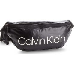Saszetka nerka CALVIN KLEIN - Ck Essentials Waistbag K60K605304 001. Czarne saszetki męskie Calvin Klein, z materiału. Za 229.00 zł.