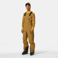 Spodnie narciarskie z szelkami Helly Hansen Ridge Infinity. Brązowe spodnie narciarskie i snowboardowe męskie Helly Hansen, bez wzorów, narciarskie. W wyprzedaży za 2,381.00 zł.