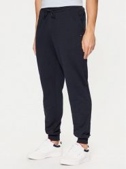 Tommy Hilfiger Spodnie dresowe Terry MW0MW37236 Granatowy Regular Fit. Niebieskie spodnie dresowe męskie Tommy Hilfiger, bez wzorów, z bawełny. Za 359.99 zł.