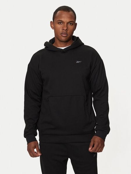 Reebok Bluza Strength Hoodie 100070728 Czarny Regular Fit. Czarne bluzy nierozpinane męskie Reebok, m, bez wzorów, z syntetyku, bez ramiączek, bez kaptura. Za 219.99 zł.