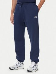 The North Face Spodnie dresowe Essential NF0A8C1F Granatowy Relaxed Fit. Niebieskie spodnie dresowe męskie The North Face, bez wzorów, z dresówki. Za 299.99 zł.