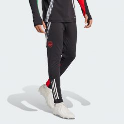 Spodnie Arsenal Tiro 24 Training. Czarne długie spodnie sportowe męskie ADIDAS, bez wzorów, z materiału, do piłki nożnej. W wyprzedaży za 183.50 zł.