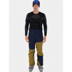 Spodnie Narciarskie Męskie Fundango Teak Colourblock. Niebieskie spodnie narciarskie i snowboardowe męskie Fundango, bez wzorów, z materiału, narciarskie. Za 599.90 zł.