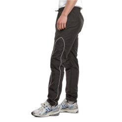 Spodnie dresowe Urban Classics Piped Panel. Czarne spodnie dresowe męskie Urban Classics, bez wzorów, z dresówki, długie. Za 213.00 zł.