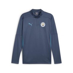 Treningowy top Manchester City 2024/25. Niebieskie bielizna termoaktywna męska Puma, bez wzorów, bez ramiączek, do piłki nożnej. W wyprzedaży za 253.85 zł.