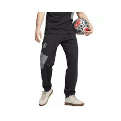 Spodnie dresowe Prematch Milan AC Pumatech Woven 2024/25. Czarne spodnie dresowe męskie Puma, bez wzorów, z dresówki. W wyprzedaży za 245.00 zł.