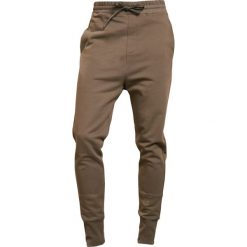 Filippa K Spodnie treningowe sand. Długie spodnie sportowe męskie marki Filippa K. Za 649.00 zł.