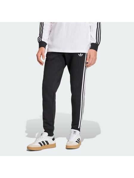 Adidas Spodnie dresowe 3-Stripes KE3562 Czarny Slim Fit. Czarne spodnie dresowe męskie ADIDAS, bez wzorów, z bawełny. Za 259.99 zł.
