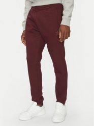 Adidas Spodnie dresowe Trefoil Essentials JD2420 Bordowy Slim Fit. Czerwone spodnie dresowe męskie ADIDAS, bez wzorów, z bawełny. Za 149.99 zł.