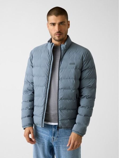 Guess Kurtka przejściowa M6RL0I WJ242 Niebieski Regular Fit. Niebieskie kurtki męskie Guess, m, z aplikacjami, z syntetyku, bez ramiączek, bez kaptura. Za 794.99 zł.