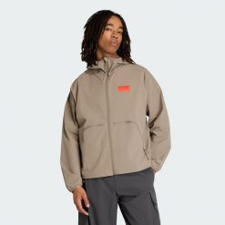 Kurtka Audi Revolut F1 Team Elevated Woven. Brązowe kurtki męskie ADIDAS, bez wzorów, sportowe, bez ramiączek, bez kaptura. Za 649.00 zł.