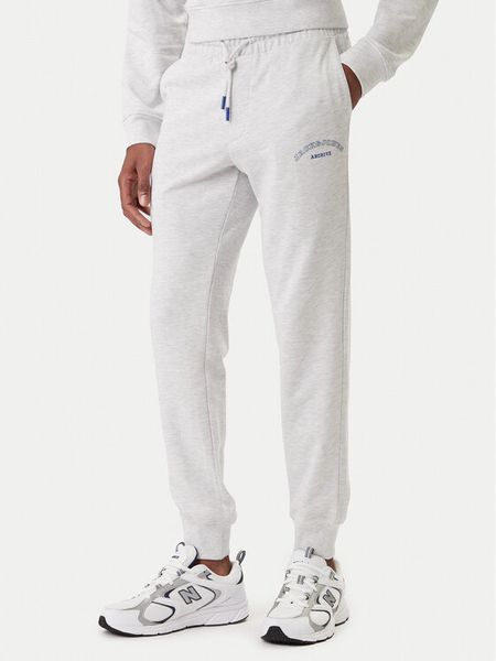 Jack & Jones Spodnie dresowe Jpstgordon 12289724 Szary Regular Fit. Szare spodnie dresowe męskie Jack & Jones, bez wzorów, z bawełny. Za 119.99 zł.
