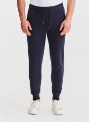 PAKO LORENTE – Granatowe spodnie dresowe. Spodnie dresowe męskie Pako Lorente, bez wzorów, z bawełny. Za 119.99 zł.