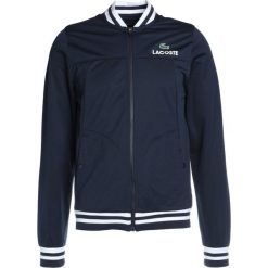 Lacoste Sport Kurtka sportowa navy blue/white. Kurtki treningowe męskie marki Lacoste Sport. W wyprzedaży za 389.25 zł.