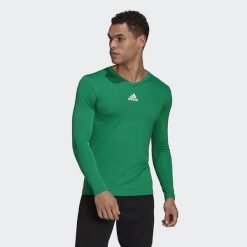 Koszulka piłkarska męska adidas Team Base Tee. Zielone bielizna termoaktywna męska ADIDAS, m, bez wzorów, bez ramiączek, do piłki nożnej. Za 66.99 zł.