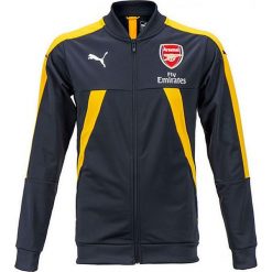 Kurtka "FC Arsenal" w kolorze granatowo-żółtym. Kurtki męskie marki Puma. W wyprzedaży za 128.95 zł.