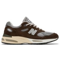 Buty męskie New Balance U991BG2 – brązowe. Brązowe buty sportowe na co dzień męskie New Balance, m, bez wzorów, z gumy, klasyczne, bez ramiączek, bez kaptura, do biegania. Za 1,149.99 zł.