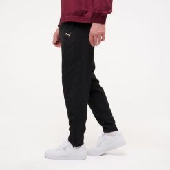 Spodnie dresowe męskie Puma Woven Gym & Pilates. Czarne spodnie dresowe męskie Puma, bez wzorów, z dresówki. Za 199.99 zł.