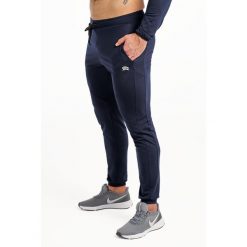 Spodnie fitness męskie Rough Radical Snappy. Niebieskie długie spodnie sportowe męskie ROUGH RADICAL, bez wzorów, na fitness i siłownię. W wyprzedaży za 119.20 zł.