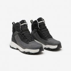 Buty turystyczne męskie Quechua MH900 wodoodporne. Czarne buty trekkingowe męskie QUECHUA, na zimę, bez wzorów, sportowe, przed kolano, bez obcasa, bez zapięcia. Za 399.99 zł.