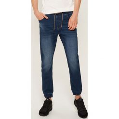 Denimowe joggery - Granatowy. Niebieskie jeansy męskie House, z jeansu. Za 99.99 zł.