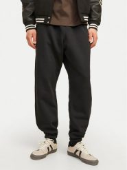 Jack & Jones Spodnie dresowe Bill Urban Edge 12263026 Czarny Relaxed Fit. Czarne spodnie dresowe męskie Jack & Jones, bez wzorów, z dresówki. Za 229.99 zł.
