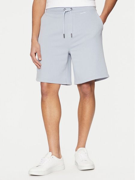 Calvin Klein Szorty sportowe Nano Logo K10K112689 Niebieski Regular Fit. Niebieskie szorty sportowe męskie Calvin Klein, bez wzorów, z bawełny, sportowe. Za 209.99 zł.