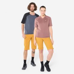 Szorty rowerowe Rockrider unisex. Brązowe szorty sportowe męskie ROCKRIDER, bez wzorów, z elastanu, sportowe. W wyprzedaży za 89.99 zł.