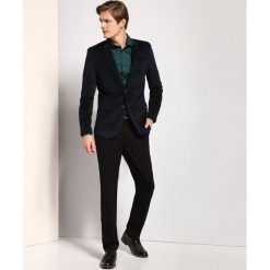 SPODNIE DŁUGIE MĘSKIE CHINOSY, KLASYCZNE. Eleganckie spodnie męskie marki TOP SECRET. W wyprzedaży za 49.99 zł.
