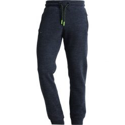 Superdry ORANGE LABEL HYPER POP Spodnie treningowe depths blue grit. Długie spodnie sportowe męskie marki Superdry. Za 389.00 zł.