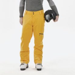 Spodnie narciarskie męskie Wedze 500. Żółte spodnie narciarskie i snowboardowe męskie WED'ZE, bez wzorów, z materiału, narciarskie. W wyprzedaży za 149.99 zł.