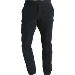 Nike Performance FLEX PANT Spodnie materiałowe black. Długie spodnie sportowe męskie marki Nike Performance. Za 399.00 zł.
