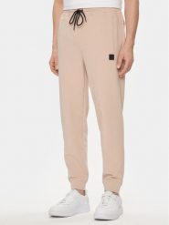 Hugo Spodnie dresowe Dimacs 50509457 Beżowy Relaxed Fit. Brązowe spodnie dresowe męskie Hugo, bez wzorów, z bawełny. Za 339.99 zł.