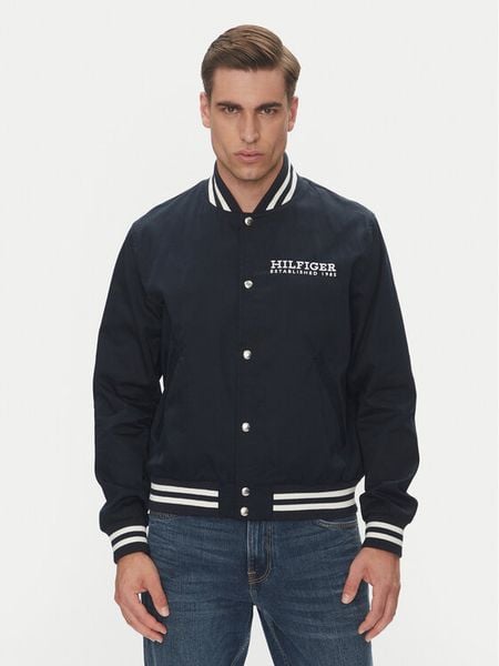 Tommy Hilfiger Kurtka bomber Americana Varsity MW0MW40647 Granatowy Regular Fit. Niebieskie kurtki męskie Tommy Hilfiger, m, bez wzorów, z bawełny, bez ramiączek, bez kaptura. Za 689.00 zł.