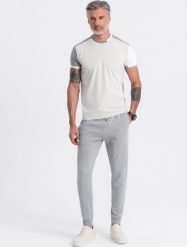 Ombre Męskie spodnie dresowe typu jogger - szare V8 OM-PABS-0173 XL. Szare długie spodnie sportowe męskie Ombre, bez wzorów, z dresówki. Za 89.99 zł.