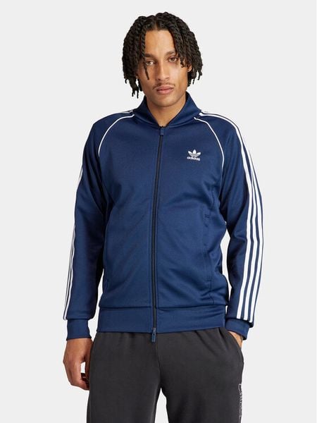 Adidas Bluza adicolor Classics SST IR9866 Niebieski Slim Fit. Niebieskie bluzy nierozpinane męskie ADIDAS, m, bez wzorów, z syntetyku, bez ramiączek, bez kaptura. Za 219.99 zł.