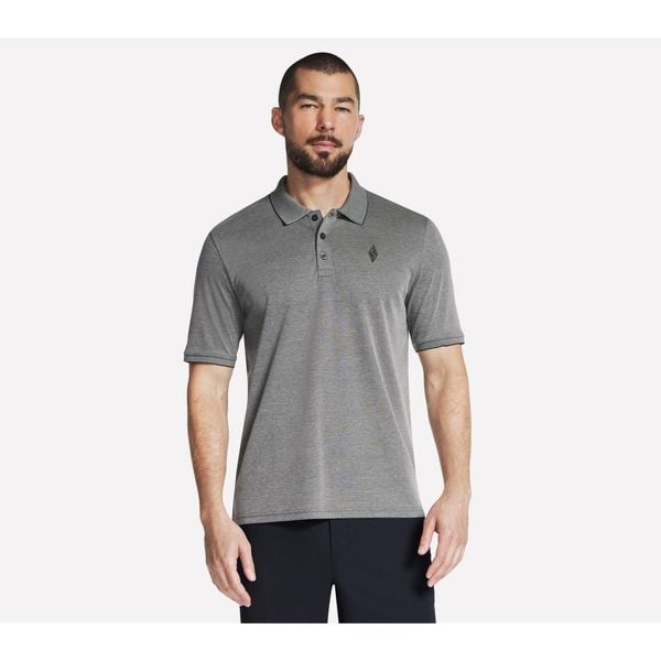 Skechers koszulka polo męska. Czarne koszulki polo męskie Skechers, m, bez wzorów, bez kołnierzyka, bez ramiączek. Za 120.99 zł.