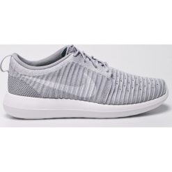 Nike Sportswear - Buty. Szare buty sportowe na co dzień męskie Nike Sportswear, z gumy, sportowe. W wyprzedaży za 259.90 zł.