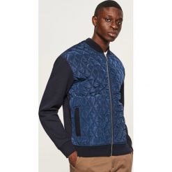 Bluza bomber z pikowanym przodem - Granatowy. Bluzy nierozpinane męskie marki DOMYOS. W wyprzedaży za 99.99 zł.