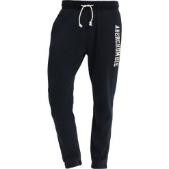 Abercrombie & Fitch CORE LOGO CLASSIC PANT Spodnie treningowe navy. Spodnie dresowe męskie marki Abercrombie & Fitch. Za 349.00 zł.