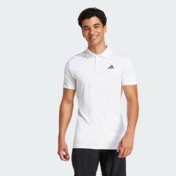 Koszulka Tennis Climacool FreeLift Polo. Białe koszulki polo męskie ADIDAS, xl, bez wzorów, sportowe, bez kołnierzyka, bez ramiączek. W wyprzedaży za 181.35 zł.