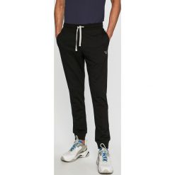 Emporio Armani - Spodnie. Spodnie na co dzień męskie Emporio Armani. W wyprzedaży za 299.90 zł.