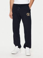Guess Jeans Spodnie dresowe M5RB52 KCPR1 Granatowy Regular Fit. Niebieskie spodnie dresowe męskie Guess Jeans, z aplikacjami, z bawełny. Za 169.99 zł.
