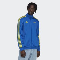 Kurtka z dresu Brésil FIFA World Cup 2022™. Niebieskie kurtki męskie ADIDAS, xl, bez wzorów, z dresówki, sportowe, bez ramiączek, bez kaptura. Za 289.85 zł.