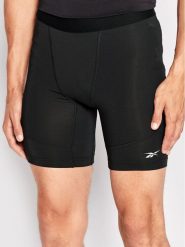 Reebok Szorty sportowe Compression HG6380 Czarny Slim Fit. Czarne szorty sportowe męskie Reebok, bez wzorów, z syntetyku, sportowe. Za 119.99 zł.