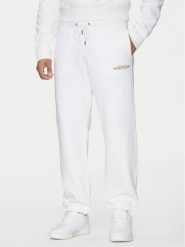 Guess Jeans Spodnie dresowe M4YB18 K9V31 Biały Regular Fit. Białe spodnie dresowe męskie Guess Jeans, z aplikacjami, z bawełny. Za 159.99 zł.