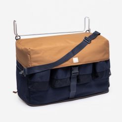 Torba stajenna granatowo-brązowa. Brązowe torby męskie na ramię FOUGANZA, bez wzorów, z materiału, biznesowe, przez ramię. Za 249.99 zł.