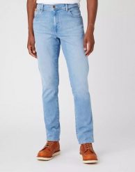 WRANGLER TEXAS SLIM MĘSKE SPODNIE JEANSOWE BLUE CHAMP W12SYI29K 112145802. Niebieskie spodnie na co dzień męskie Wrangler, bez wzorów, z bawełny, klasyczne. W wyprzedaży za 114.99 zł.